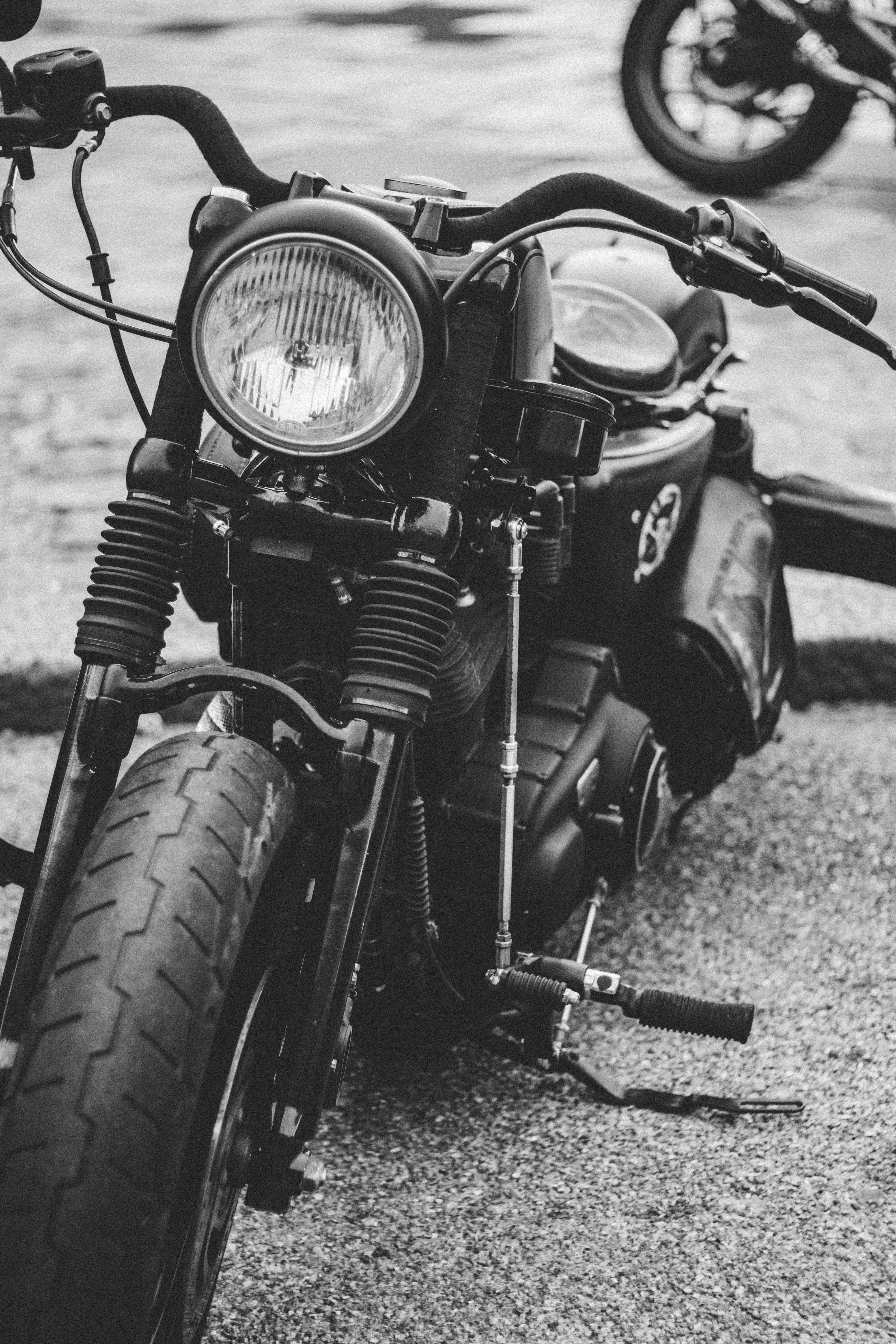 black and white image of a motorcycle